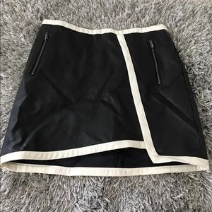 White & black leather skirt